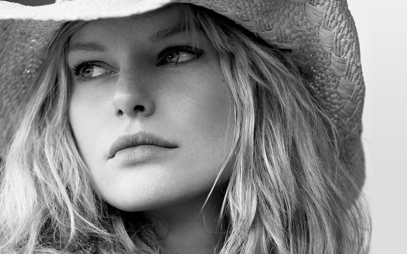 Woman Wearing Straw Hat — Black