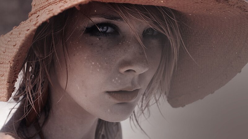 Woman Wearing Straw Hat — Brown, Dramatic, Photograph, Straw Hat, Freckles