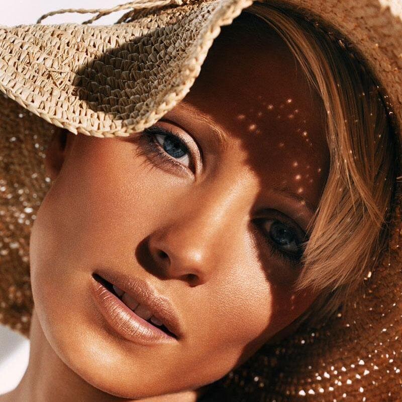 Woman Wearing Straw Hat — Brown, Serene