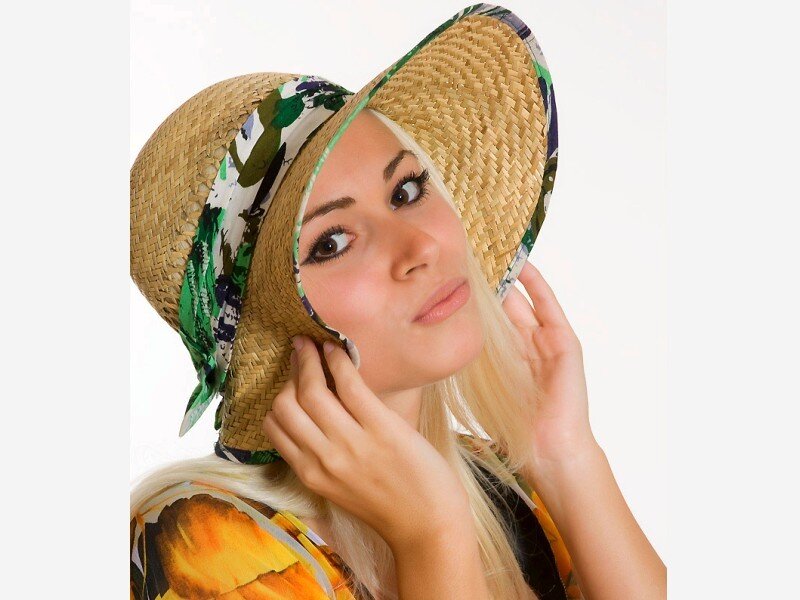 woman wearing straw hat