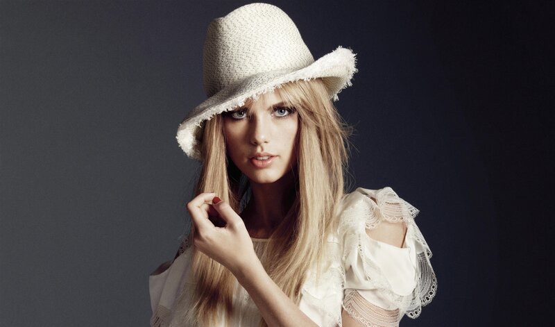 Woman Wearing Straw Hat — White, Dramatic, Photograph