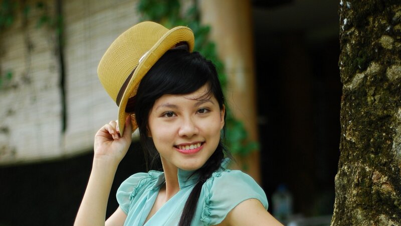 Woman Wearing Straw Hat — Yellow, Calm, Afternoon