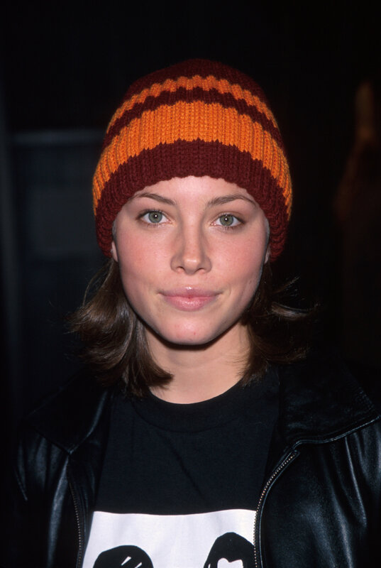 woman wearing striped beanie