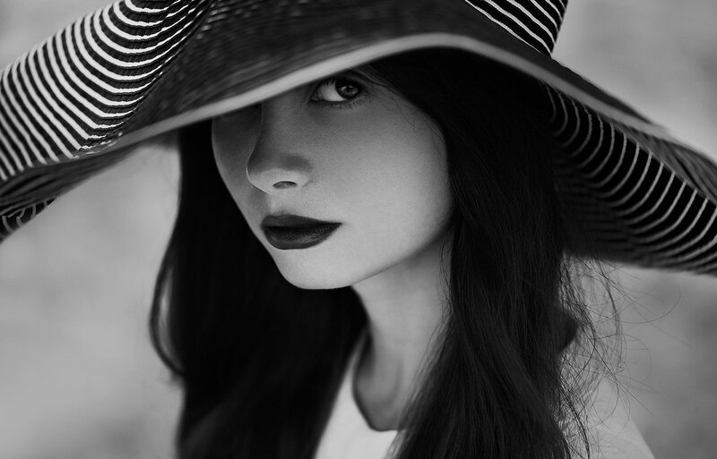 Woman Wearing Striped Hat — Black