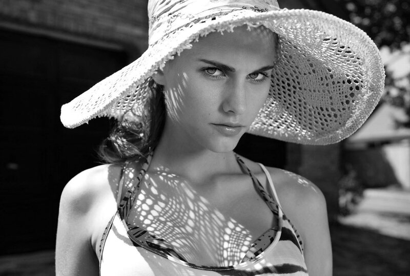 Woman Wearing Sun Hat — Black