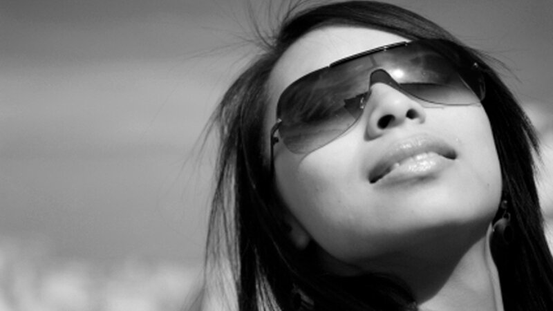 Woman Wearing Sunglasses — Black, Serene