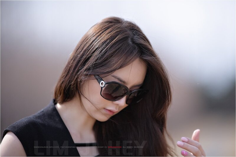 Woman Wearing Sunglasses — Brown, Contemplative, Afternoon