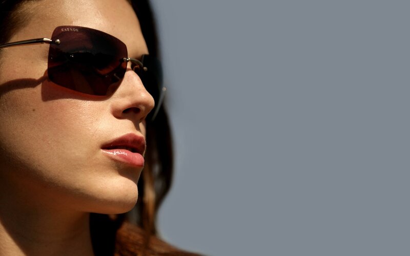 Woman Wearing Sunglasses — Brown, Neutral