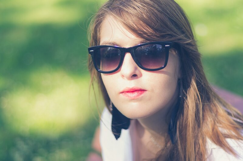 woman wearing sunglasses outdoors