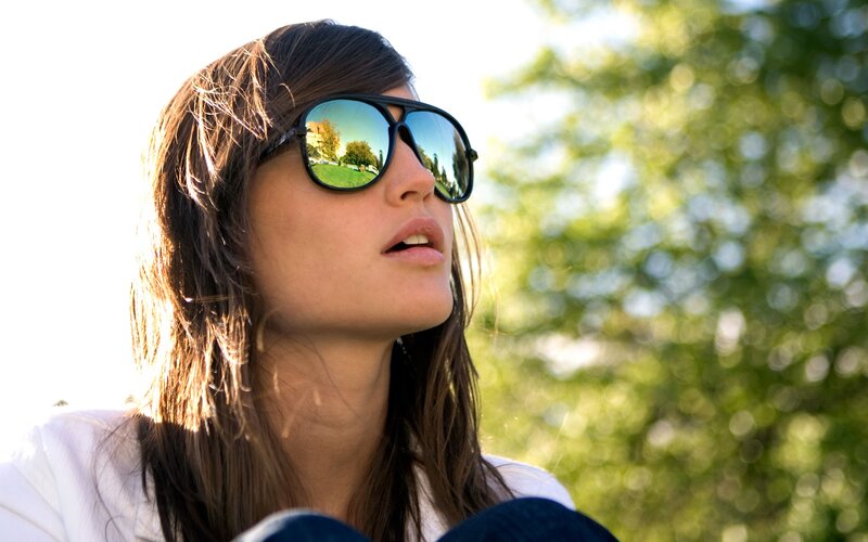 woman wearing sunglasses outdoors