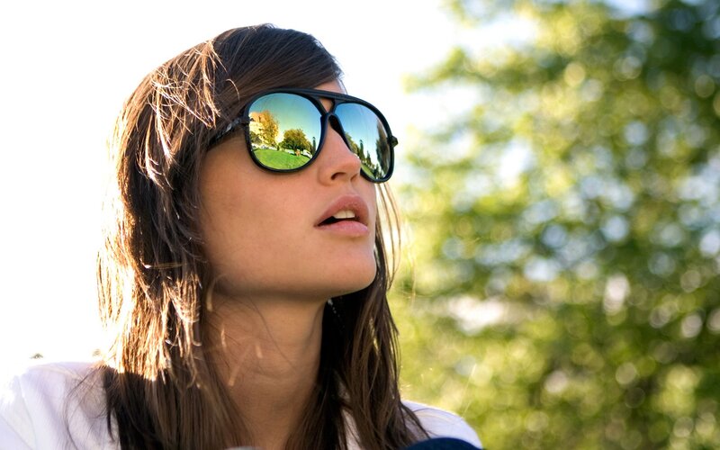 woman wearing sunglasses outdoors