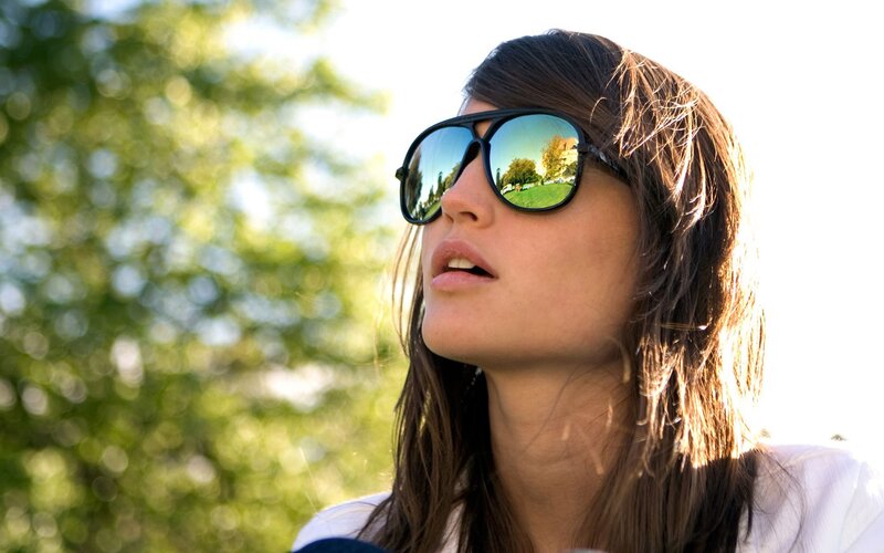 woman wearing sunglasses outdoors