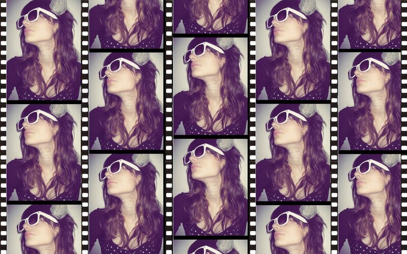 Woman Wearing Sunglasses — Purple