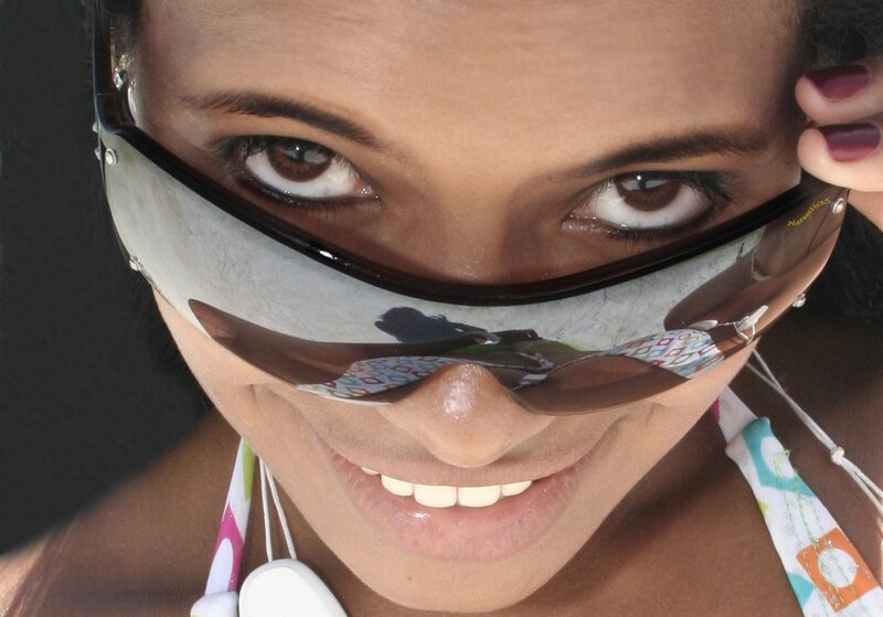 woman wearing sunglasses smiling