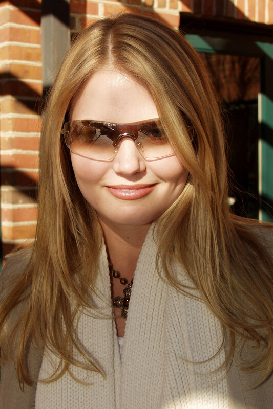 woman wearing sunglasses smiling