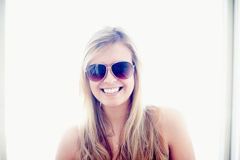 woman wearing sunglasses smiling