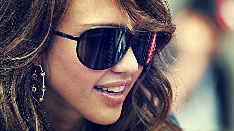 woman wearing sunglasses smiling