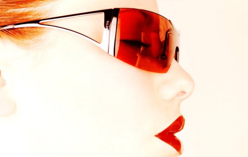 Woman Wearing Sunglasses — White, Dramatic