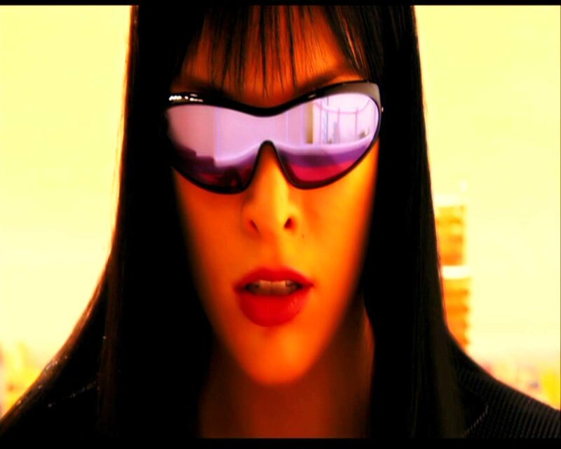 Woman Wearing Sunglasses — Yellow