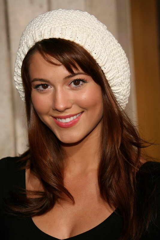 woman wearing white beanie hat