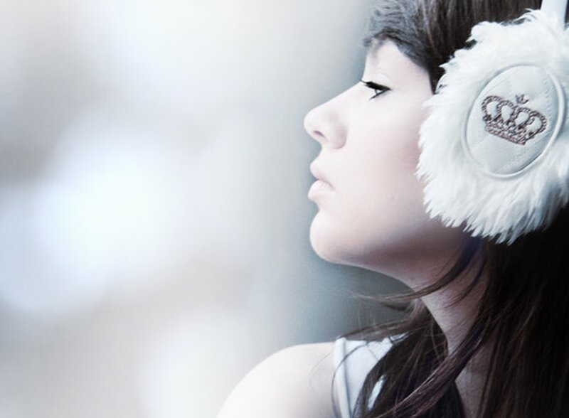 woman wearing white earmuffs