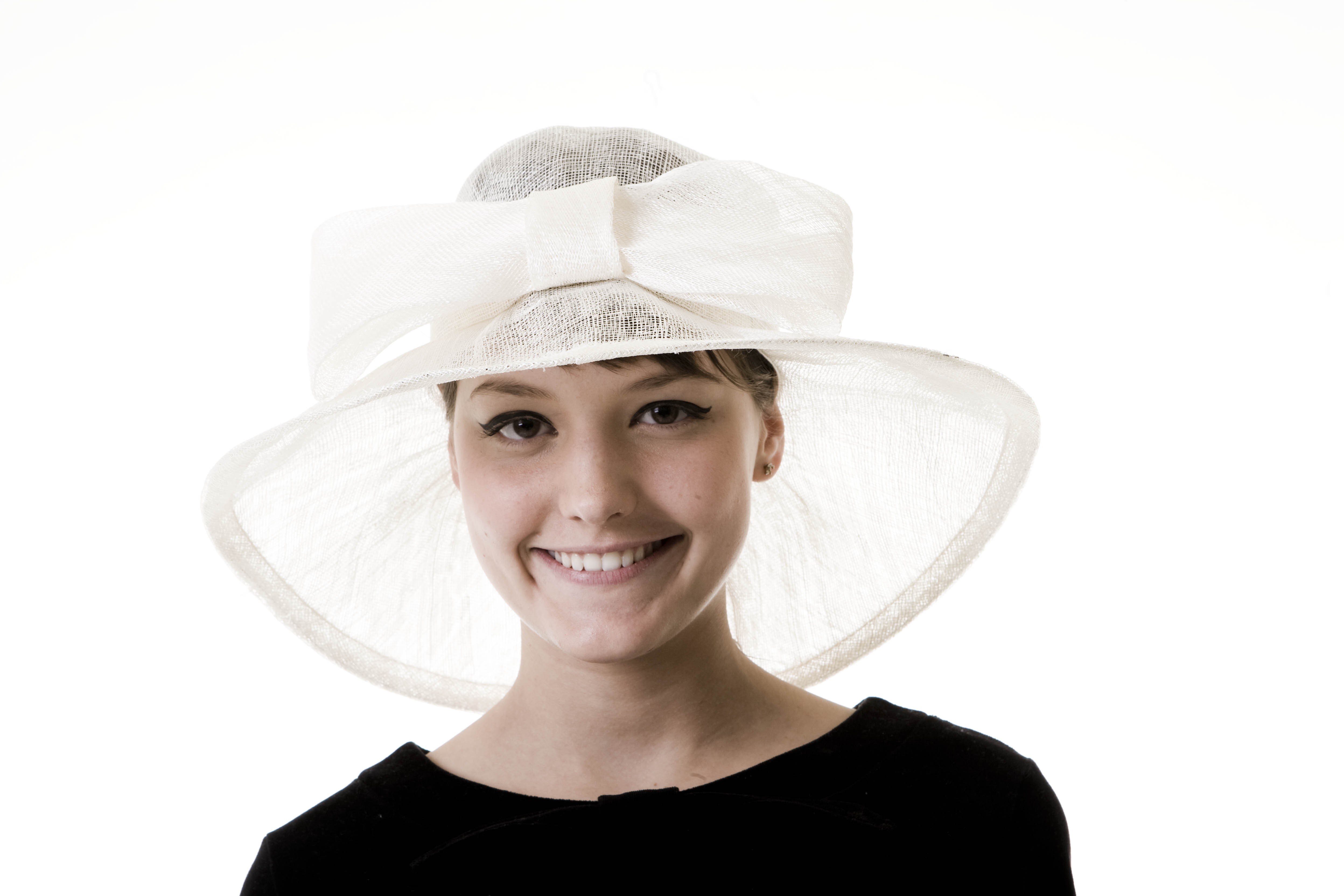 woman wearing white hat