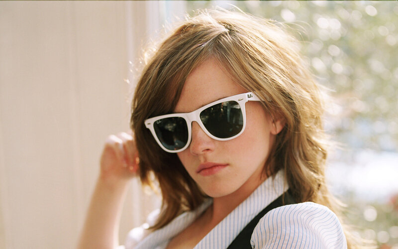 woman wearing white sunglasses