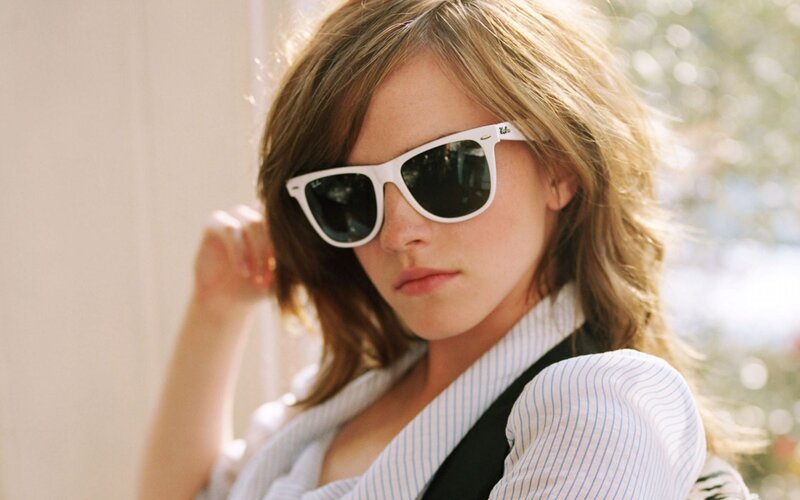 woman wearing white sunglasses