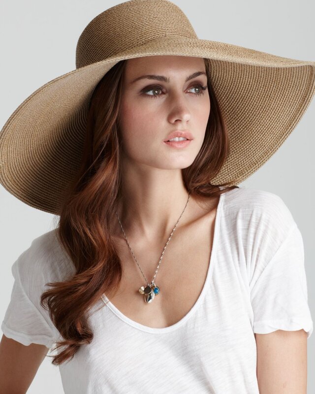 woman wearing wide-brim hat