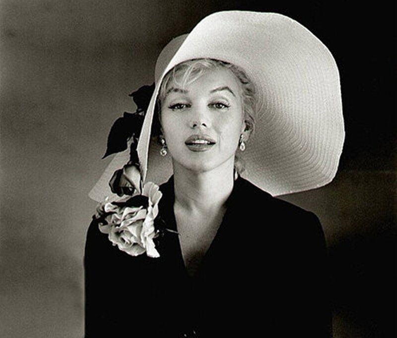 Woman Wearing Wide-brimmed Hat — Black, Dramatic, Photograph, Flower
