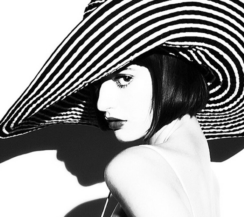 Woman Wearing Wide-brimmed Hat — Black, Dramatic
