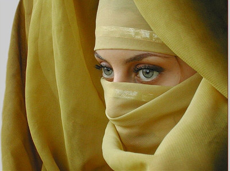 Woman Wearing Yellow Hijab — Serious