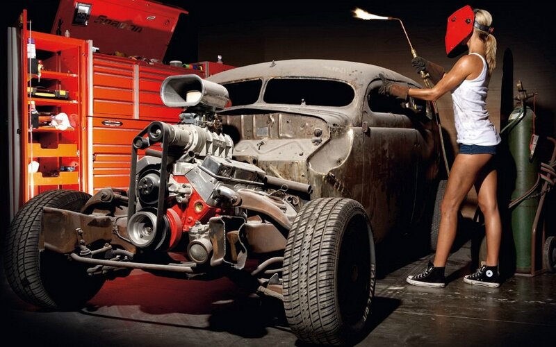 Woman Welding Car