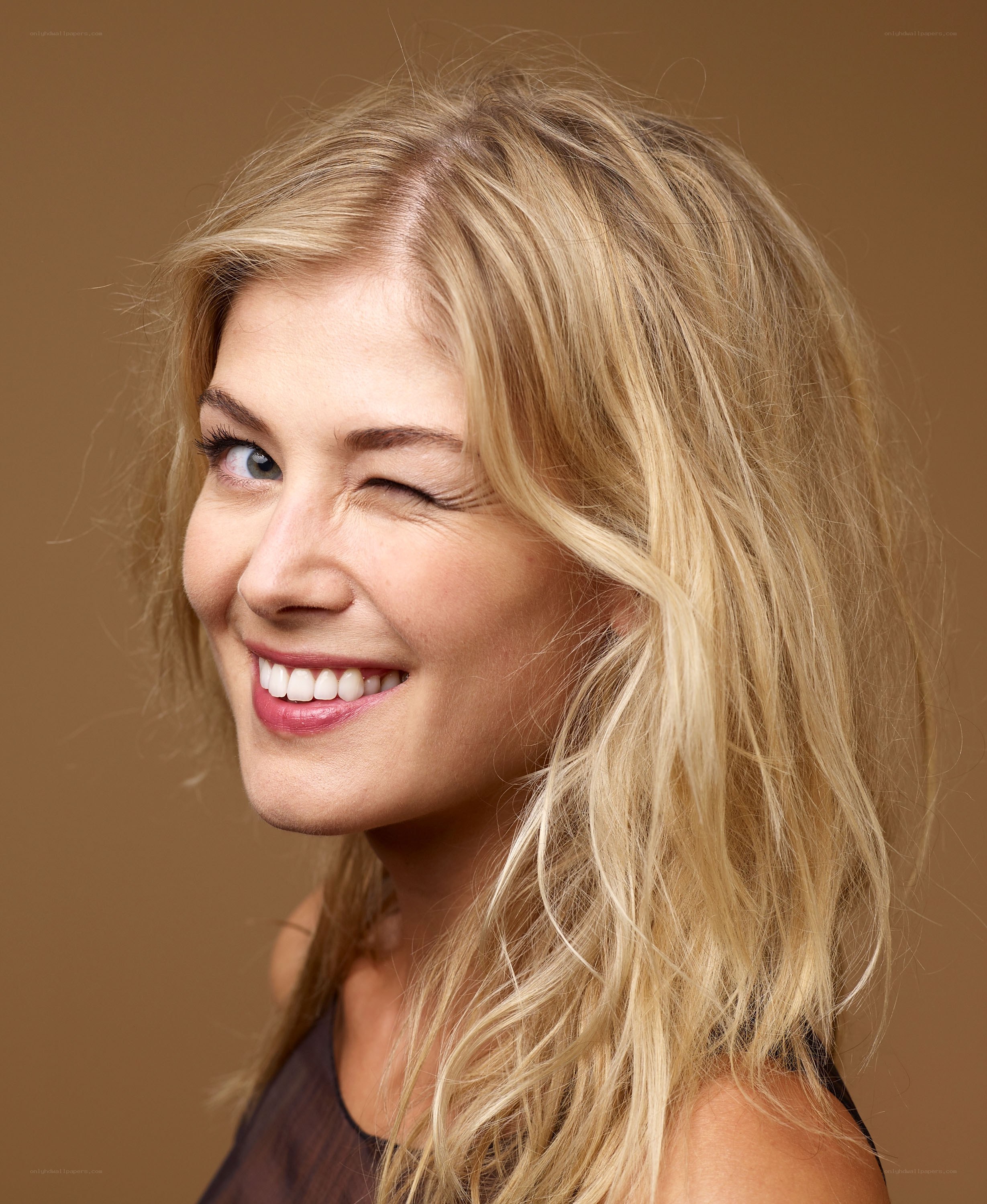 woman winking and smiling