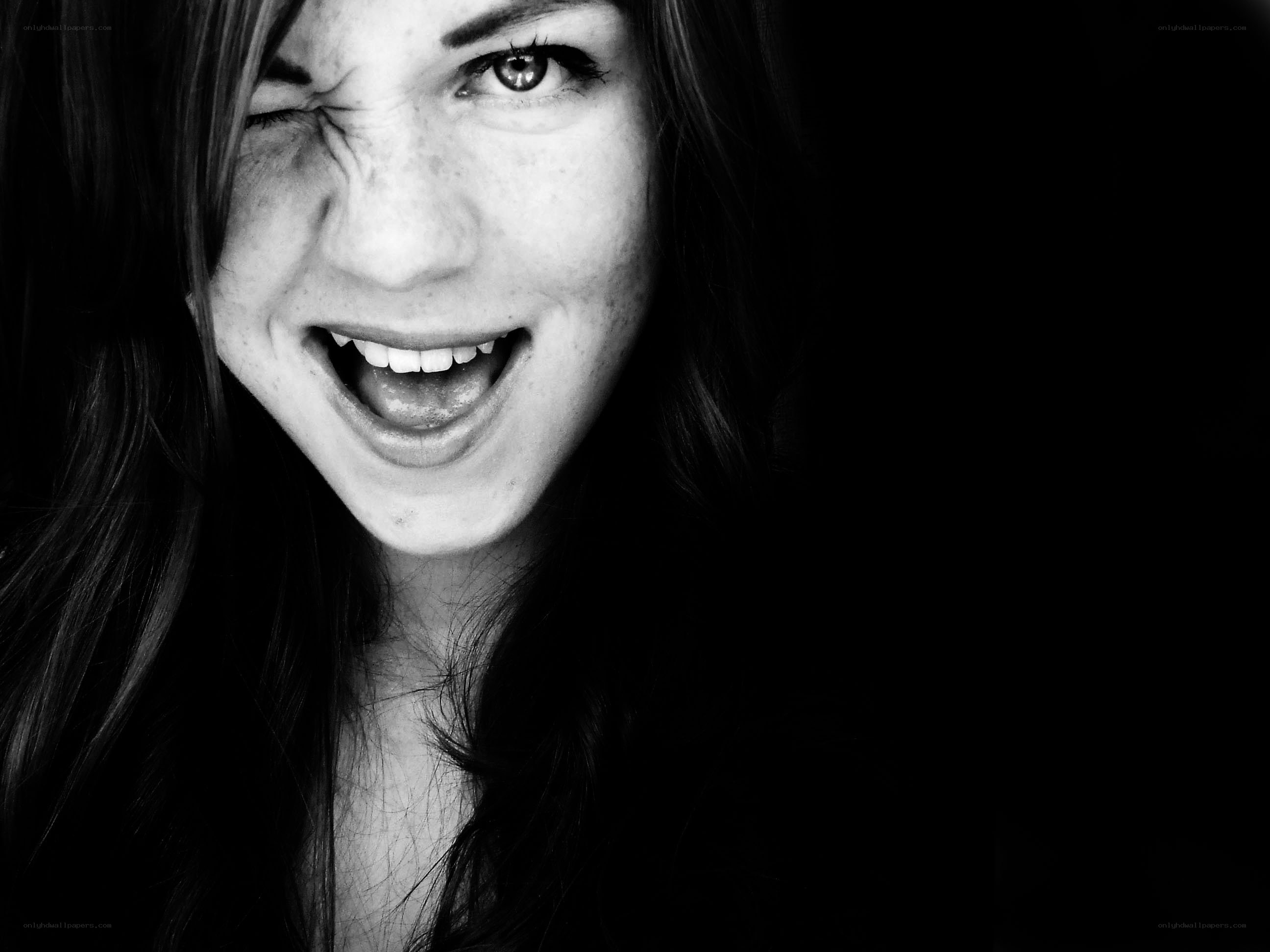 woman winking and smiling