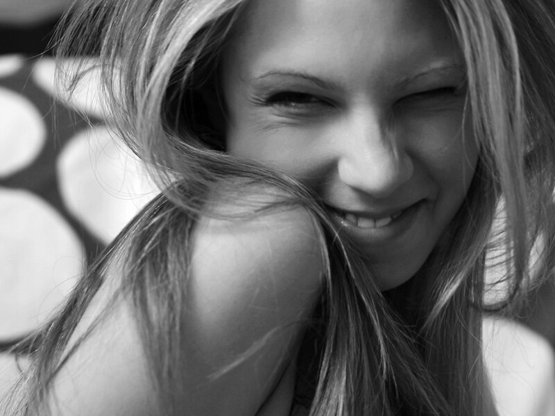 Woman Winking at Camera — Black