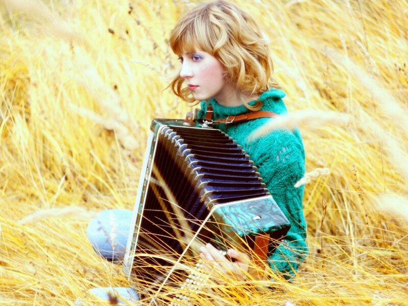 Woman with Accordion — Yellow