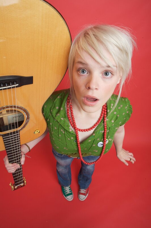 Woman with acoustic guitar