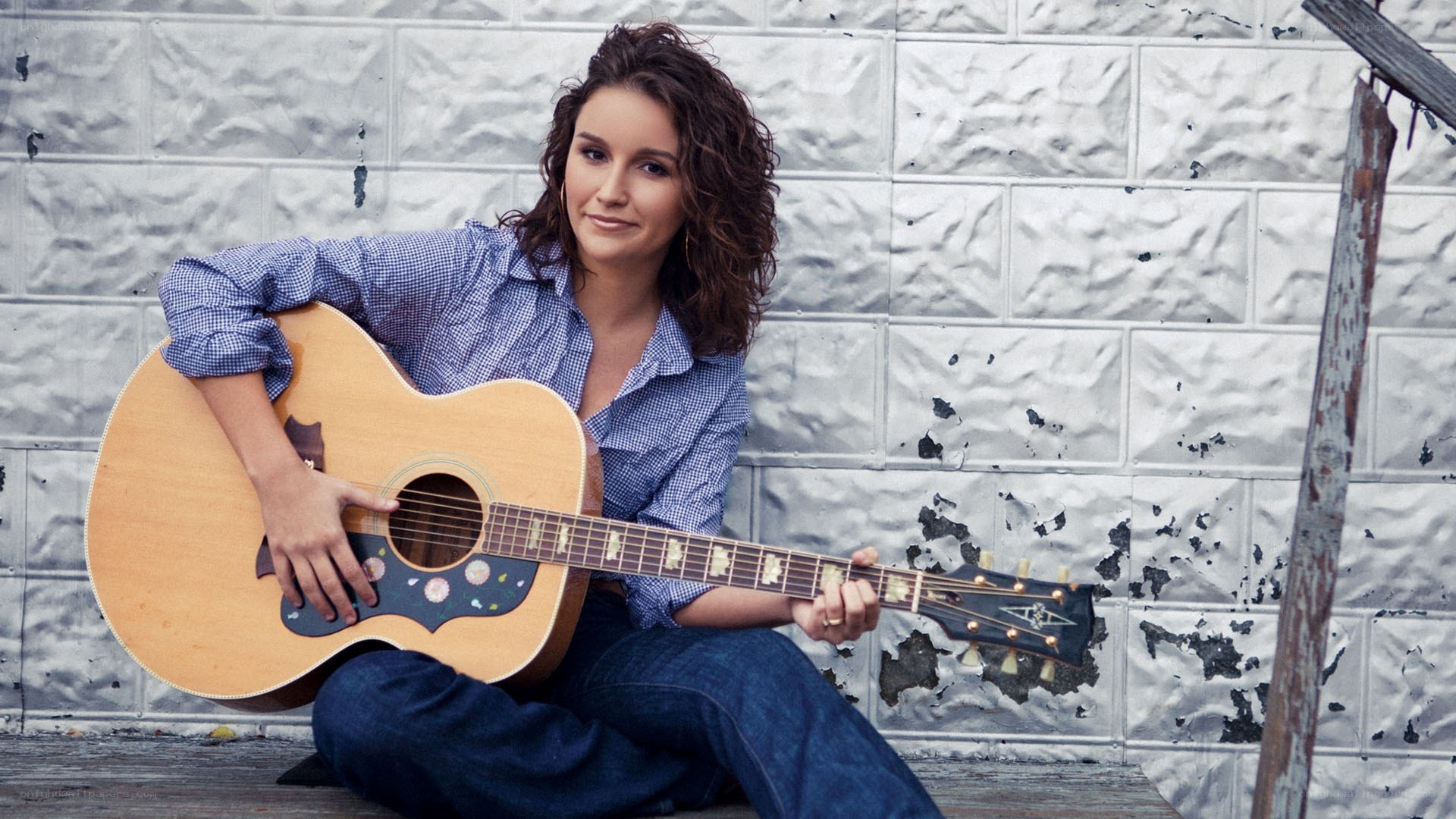 woman with acoustic guitar