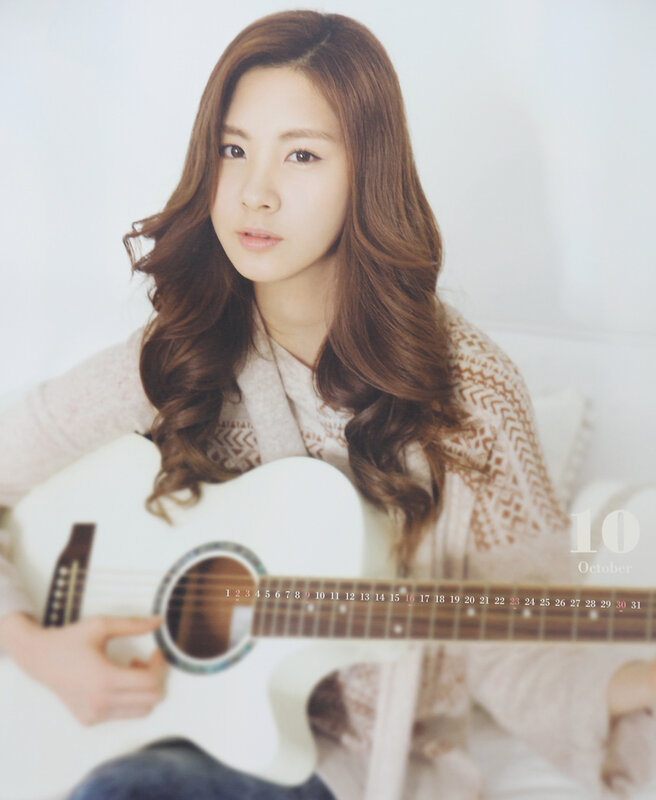 woman with acoustic guitar
