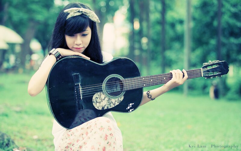 woman with acoustic guitar