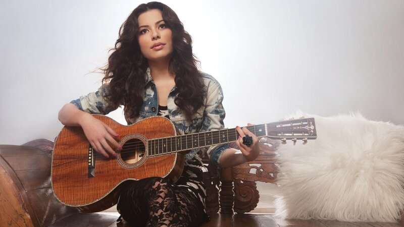 woman with acoustic guitar
