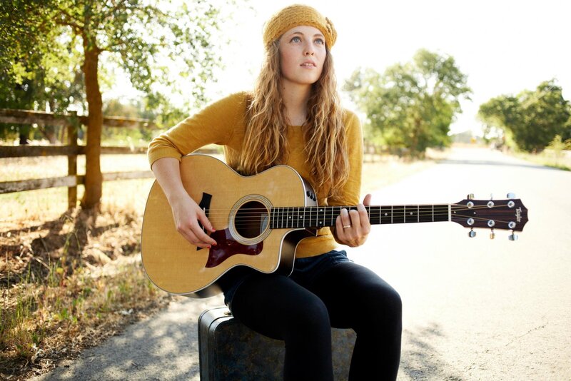 woman with acoustic guitar