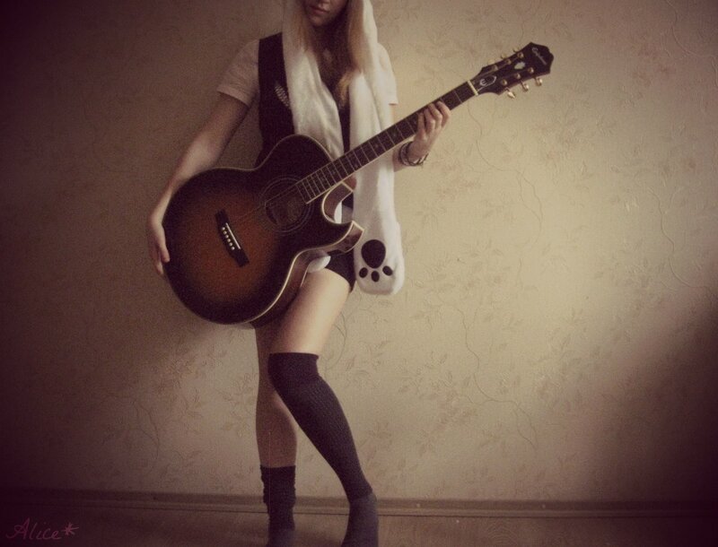 Woman with acoustic guitar