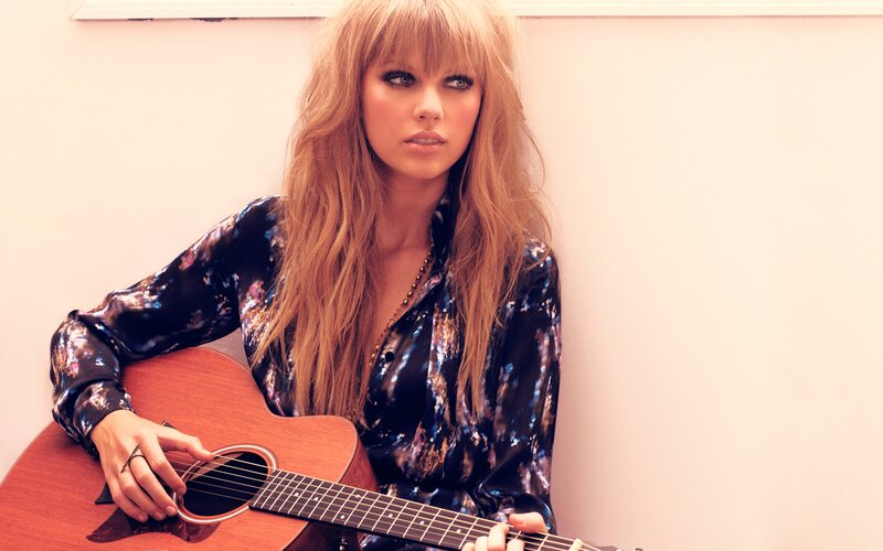 woman with acoustic guitar