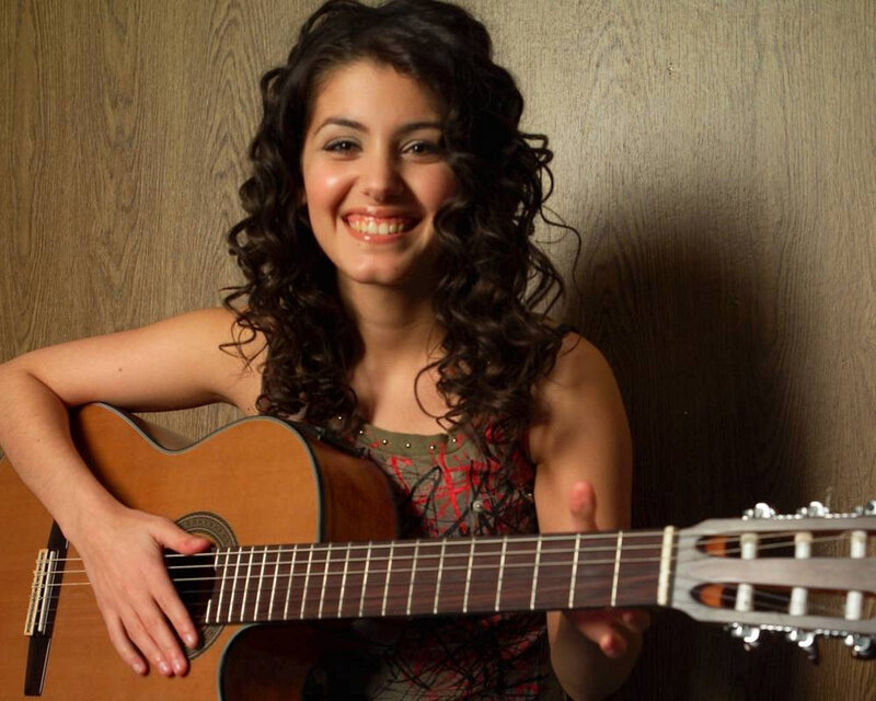 woman with acoustic guitar