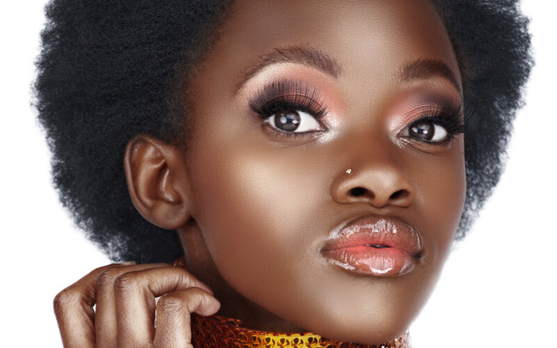 Woman with Afro Hairstyle — Brown
