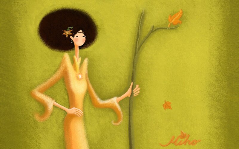 woman with afro holding branch