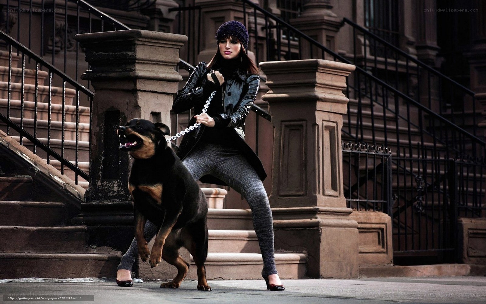 Woman with aggressive dog on leash