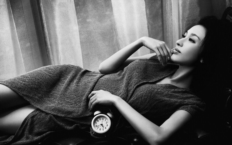 woman with alarm clock